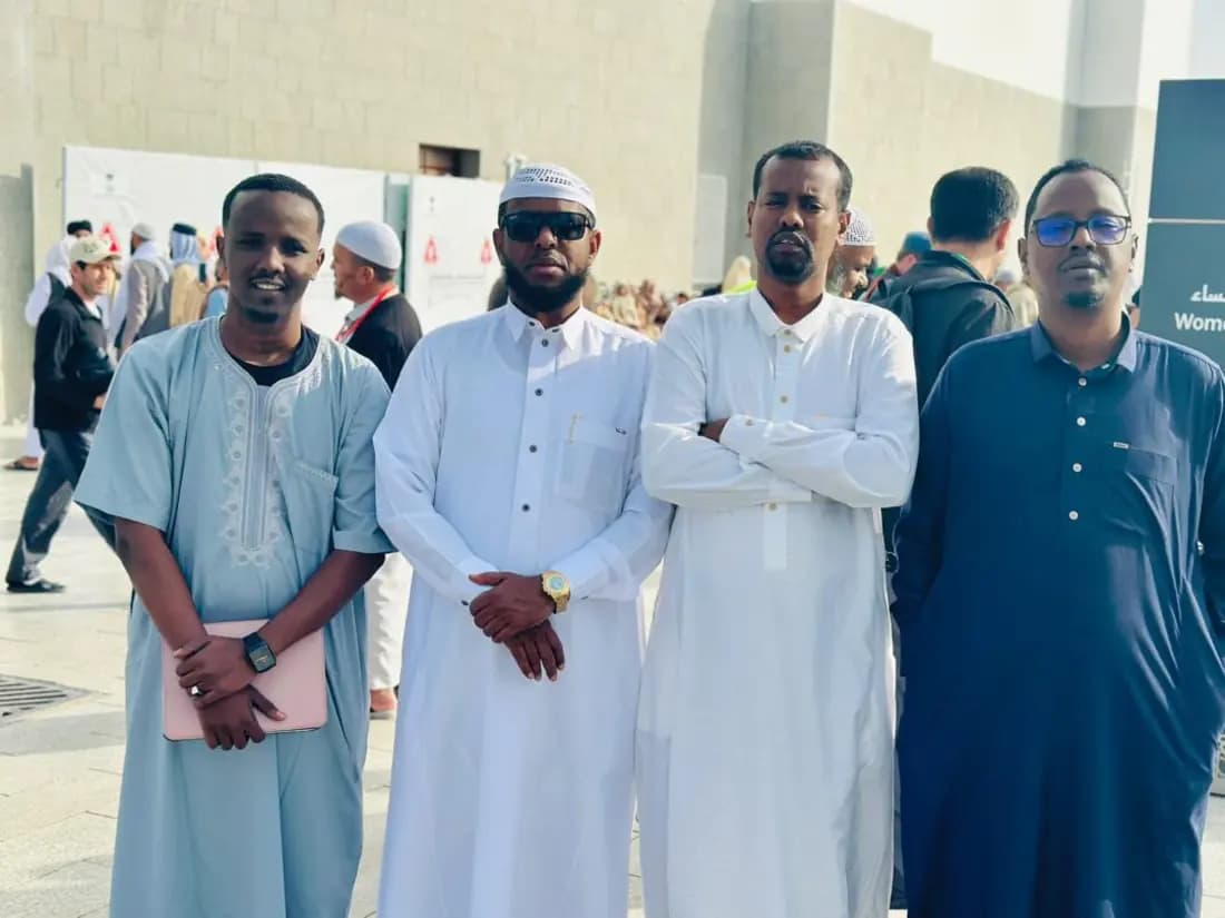 Four STS team members outside the Prophet's Mosque in Madinah